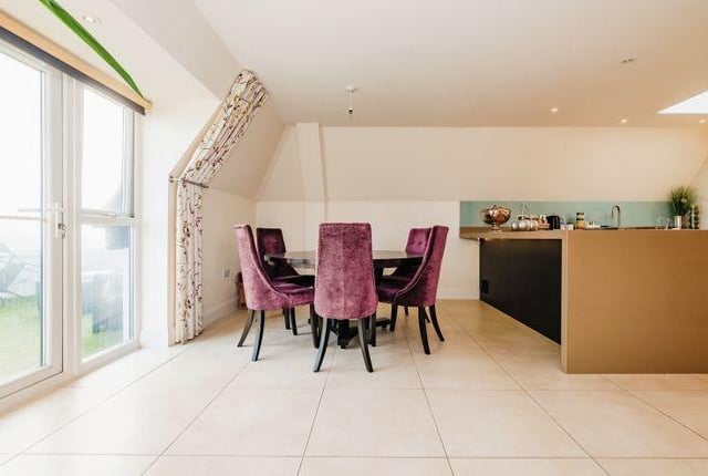 The separate dining area is situated just off the kitchen.