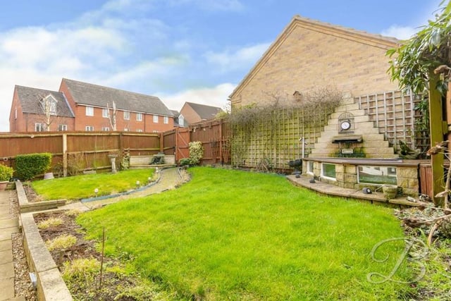 The rear garden at the £290,000-plus Mansfield property boasts some interesting, characterful features. It's certainly not a garden that would ever bore you!