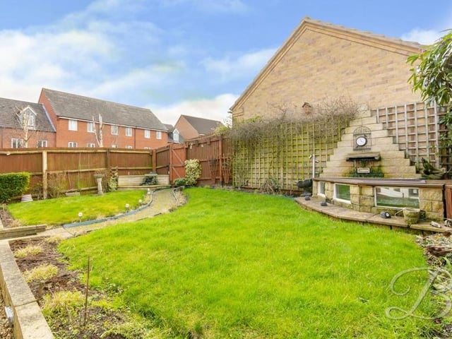 The rear garden at the £290,000-plus Mansfield property boasts some interesting, characterful features. It's certainly not a garden that would ever bore you!