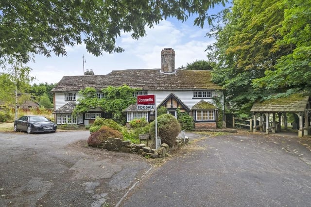 The house in Church Road, Worth, Crawley, has a guide price of £1,250,000