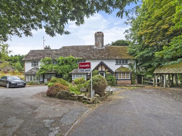 The house in Church Road, Worth, Crawley, has a guide price of £1,250,000