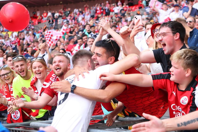 Crawley Town celebrated an historic day for the club after winning promotion to League One at Wembley with victory over Crewe.