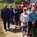 Hailsham Tennis Club members pose with Debbie (front in blue).