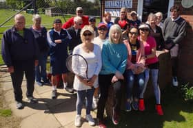 Hailsham Tennis Club members pose with Debbie (front in blue).