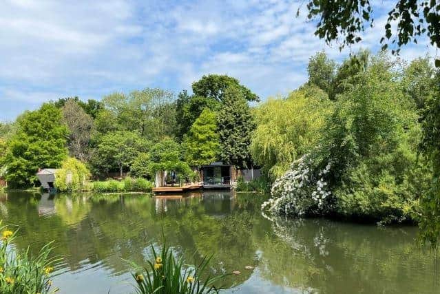 A Storrington couple want to convert a houseboat on a pond in their back garden into a holiday let