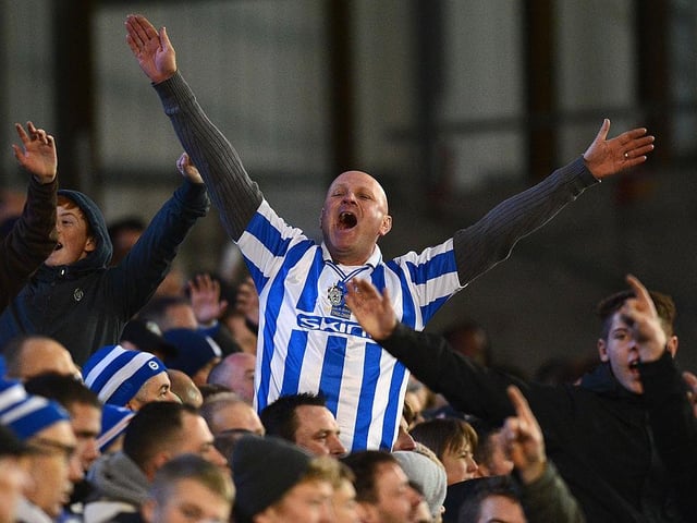 A Brighton fan makes himself heard during the npower Championship match between Brighton & Hove Albion and Bristol City at Amex Stadium on November 27, 2012.