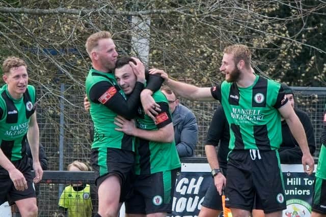 Burgess Hill Town players celebrate Dan Perry's goal, which proved to be a crucial winner at home to Three Bridges | Picture: Chris Neal