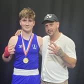 Conor McCormack, left, with his Southbourne Panthers Gym coach Ash Whiting after his Three Nations tournament triumph