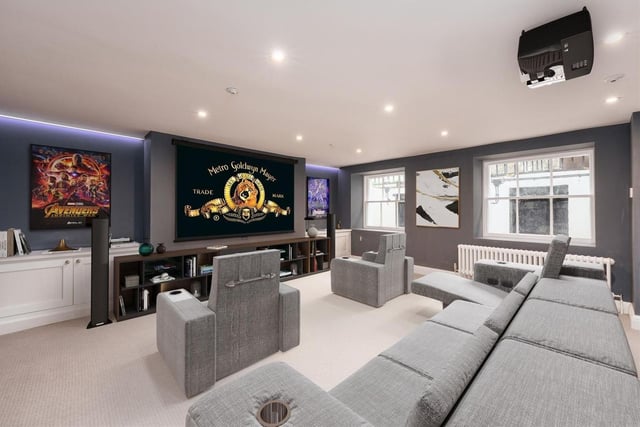 The property's basement houses this cinema room, as well as a games room