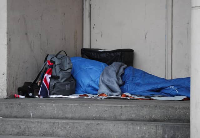 A homeless person sleeping rough in a doorway in Farringdon, London. PRESS ASSOCIATION Photo. Picture date: Tuesday February 7, 2017. Photo credit should read: Yui Mok/PA Wire 