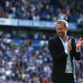Brighton manager Graham Potter applauds the fans during a lap of honour during the Premier League match between Brighton & Hove Albion and West Ham United (Photo by Charlie Crowhurst/Getty Images)