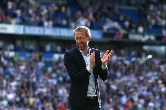 Brighton manager Graham Potter applauds the fans during a lap of honour during the Premier League match between Brighton & Hove Albion and West Ham United (Photo by Charlie Crowhurst/Getty Images)