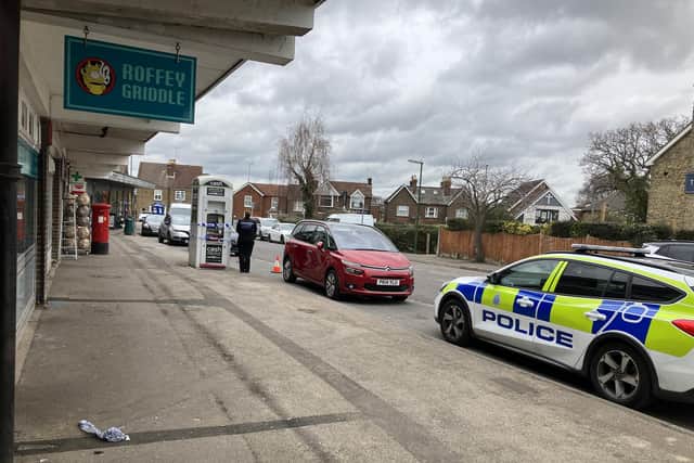 Police at the scene of the theft outside Roffey shops