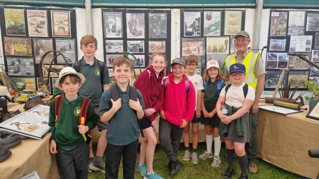 Museum of Gardening founder, Clive Gravett, with members of West Hoathly school's gardening club