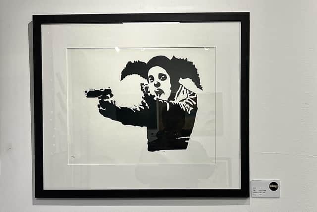 Close-up of the limited-edition Banksy print.