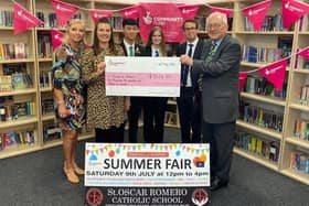 Friends of St Oscar Romero Catholic School celebrate after receiving £5,426 in National Lottery funding