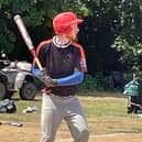 Fin James in softball action