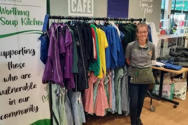 Morrisons community champion Joanne Easey with school uniform being given away free at a special event earlier this month