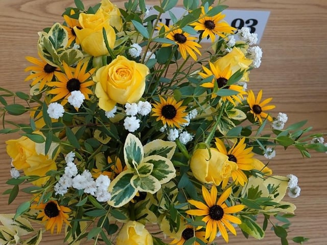 A table decoration for a golden wedding, winning first prize for Sarah Hill