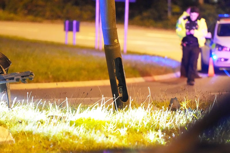 Police officers were called after a car overturned on a roundabout in Crawley