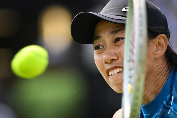 China's Zhang Shuai returns to Britain's Harriet Dart during their women's singles round of 32 tennis match