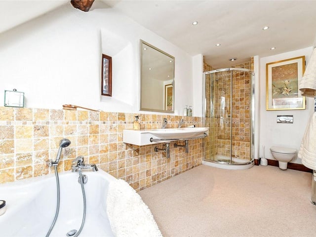 One of several beautifully fitted bathrooms.