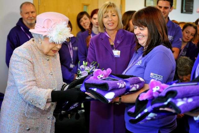 The Queen visited Canine Partners, Mill Lane, Heyshott, recieves gifts. Pic Steve Robards SR1728947
