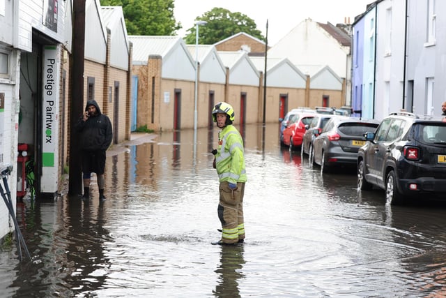 Flooding in Station Road, Worthing. Picture by Eddie Mitchell