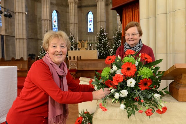 Flower arrangers Mary Harding, left, and Margaret Myerscough preparing Arundel Cathedral for the Christmas Eve midnight mass in 2014