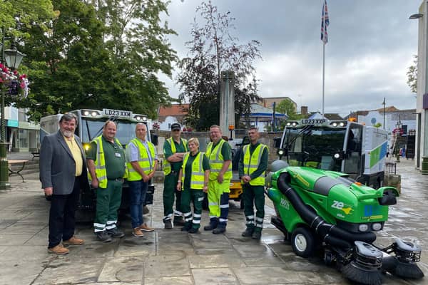 Horsham Councillor Jay Mercer with some of Horsham District Council's  recycling, waste  and street cleansing crew