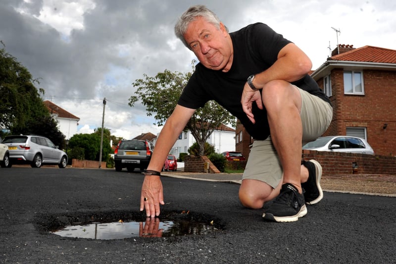 Hurst Avenue resident John Frew is frustrated with the recent resurfacing of the road outside his home