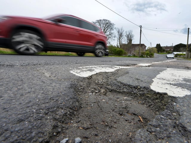 Potholes in Jevington Road, Polegate (Photo by Jon Rigby)