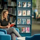 Enjoying reading in a West Sussex Library
