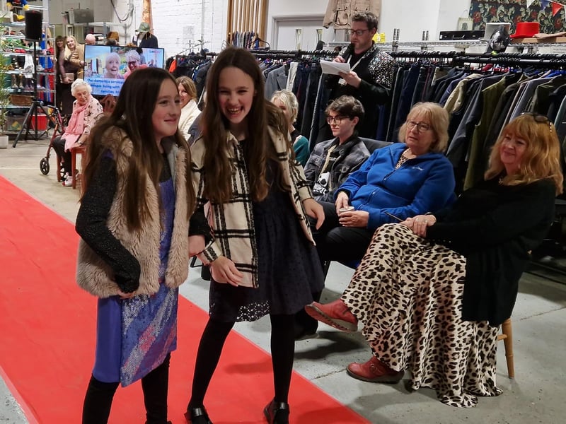 Maddison and Scarlet showcasing some of the children's fashion