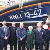 Representatives from Littlehampton Lifeboat Station and fundraising branch attending the Westminster Thanksgiving Service on March 4, 2024. Pictured in front of a lifeboat at Westminster Abbey, left to right, are Anthony Fogg, Gill Partington, Cian Mathews, Nick White, Jim Cosgrove, Lynne Stephens and Ian Flack.