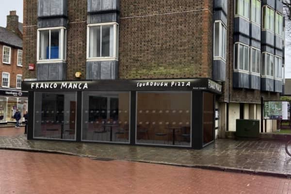 Proposed new signs for Franco Manca, planned in South Street, Chichester opposite the Market Cross