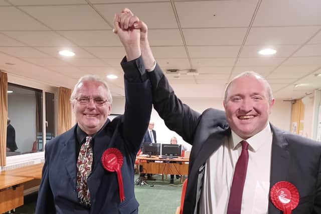 Bob Noyce and Michael Jones celebrate Labour's by-election win