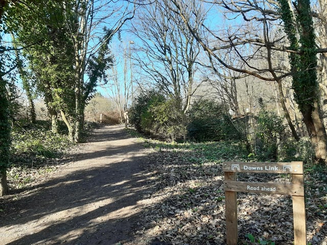 As you head back through the trees, a sign warns you of the road ahead and here we start to go uphill.