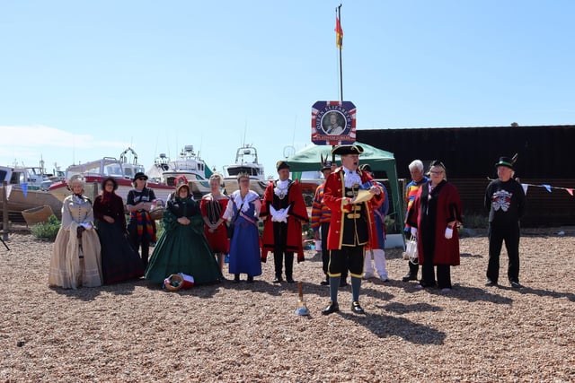 The Platinum Jubilee weekend in Hastings. Photo by Kevin Boorman. 2/6/22

Hastings town crier Jon Bartholomew reading the Platinum Jubilee Royal Proclamation on the beach with Hastings Borough Bonfire Society members in the background.