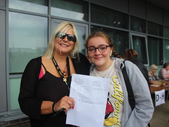 Bexhill Academy students with their GCSE results