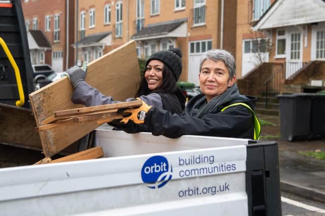 Leah Thompson, Property Manager for Orbit and Jackie Thompson, General Manager for MPS collect waste as part of a community spring clean event at Deepdene Gardens in Hastings
