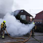 Firefighters wearing breathing apparatus ‘quickly got to work’ to extinguish the fire, using jets and thermal imaging cameras, the fire service said. Photo: Eddie Mitchell