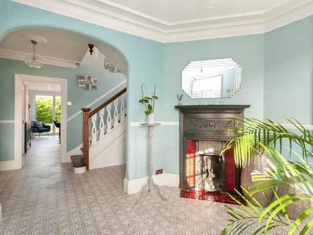 The property consists of a front porch and beautiful period entrance hallway with stairs leading to the second floor. A spacious lounge, large dining room, and a stunning fitted kitchen with island.