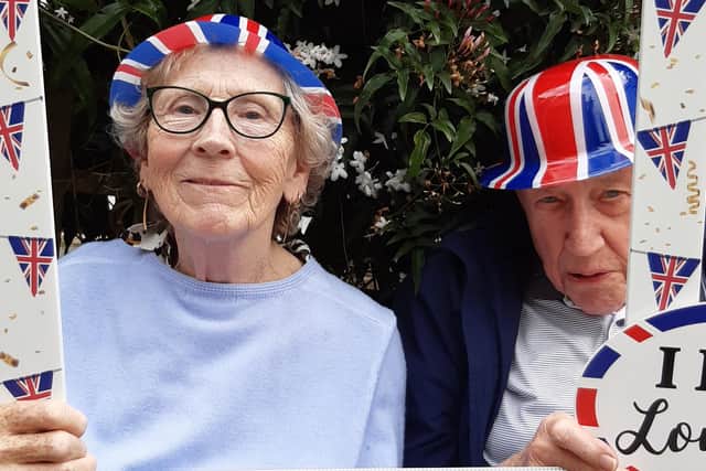 Guild Care residents Liz and Brian enjoying the Jubilee celebrations at Linfield House