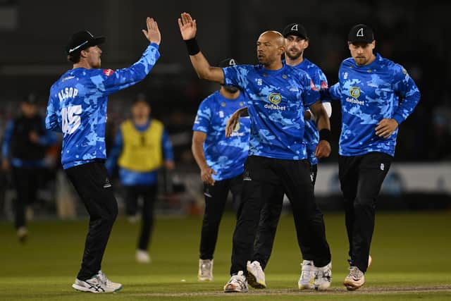 Tymal Mills of Sussex celebrates with team mates after dismissing Tom Lammonby of Somerset during the Vitality Blast T20 match between Sussex Sharks and Somerset CCC at The 1st Central County Ground on May 26, 2023 in Hove, England. (Photo by Mike Hewitt/Getty Images)