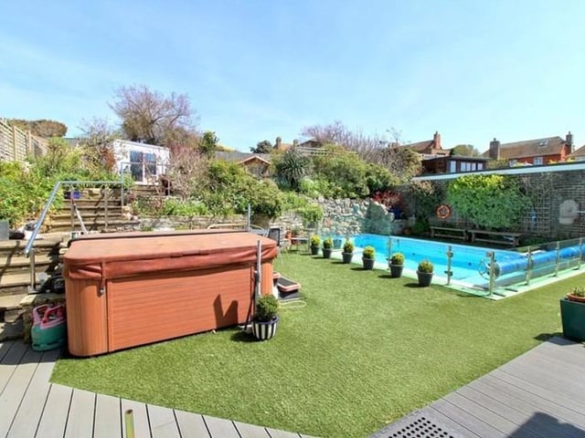 The property has the benefit of an attractive landscaped rear garden with swimming pool, off road parking for several vehicles and integral double garage.
