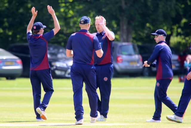 Ben Williams, blond hair, celebrates a Roffey wicket with his Horsham teammates | Picture: John Lines