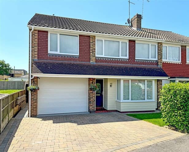 This end-of-terrace house has been extended to offer five bedrooms. It has come on the market with Glyn Jones priced at £435,000. The agents say it is immaculately presented and available with no forward chain.