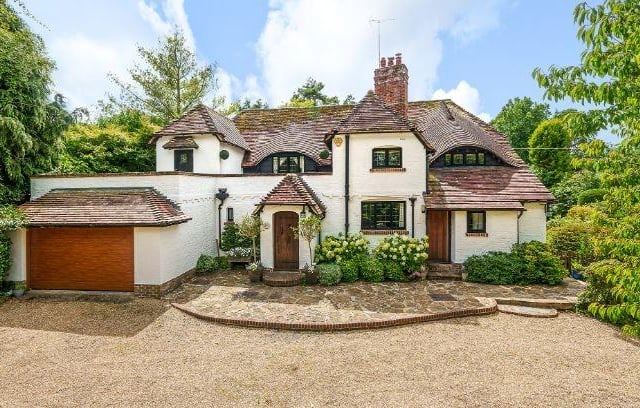 The property benefits from an attached double garage and a newly-erected oak carport