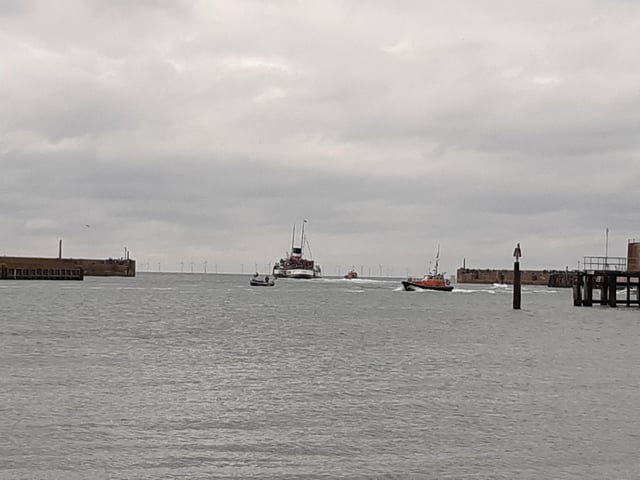 Amazing, stunning, emotional - the large crowd that stood on Kingston Beach to watch the world’s last seagoing paddle steamer make its inaugural visit to Shoreham was visibly moved by the sight of the Waverley making its way in and out of the harbour on Wednesday, September 13.